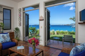 Luxury Suite Ocean View Lower 3A | Living area | 40-inch TV with cable channels, DVD player - Suite St. John at Gallows Point Resort (St. John)
