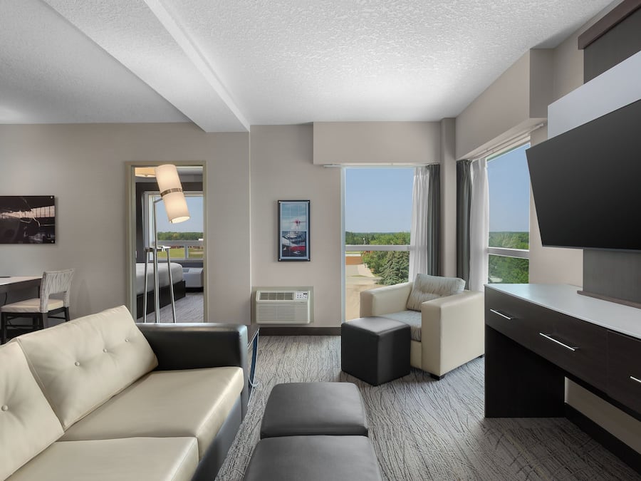 Premium bedding, down comforters, pillowtop beds, in-room safe