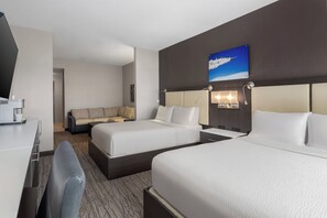A hotel room with two beds, a desk, a chair, and a sofa. - Holiday Inn Express & Suites Cold Lake by IHG (Cold Lake)