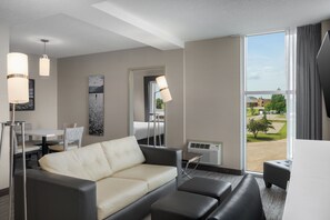 Premium bedding, down comforters, pillowtop beds, in-room safe