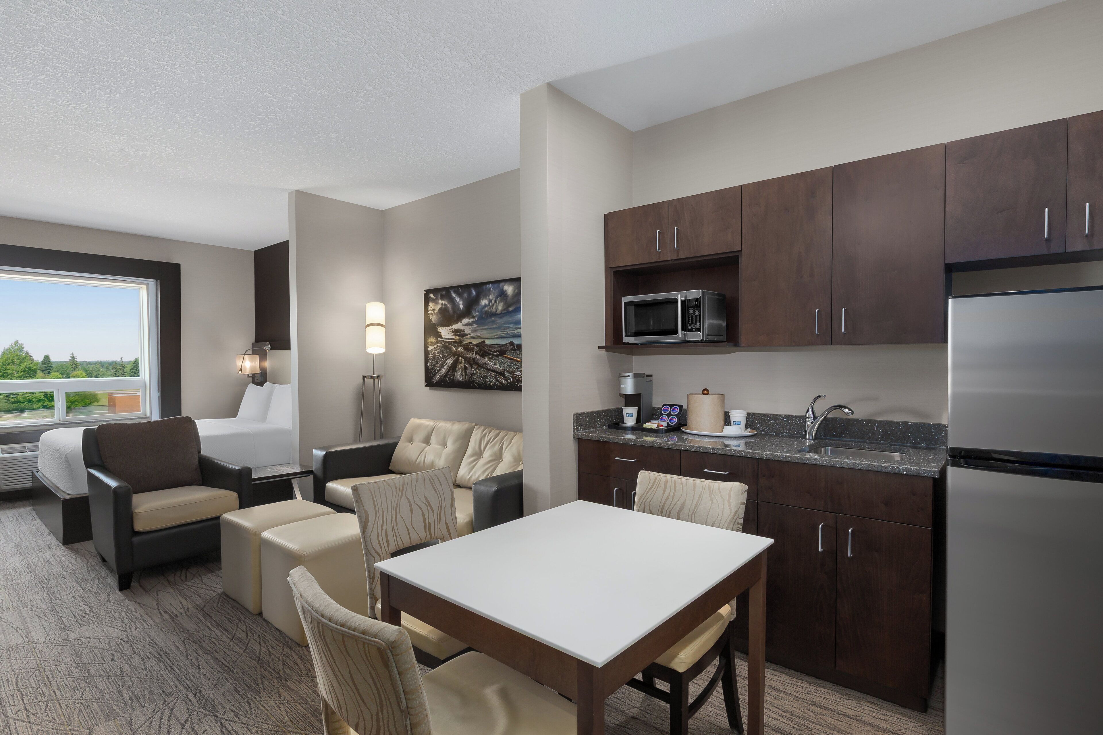 Premium bedding, down comforters, pillowtop beds, in-room safe