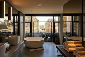 Studio Suite, 1 Bedroom (Extreme WOW Exchange, Round bed) | Bathroom | Designer toiletries, hair dryer, bathrobes, slippers