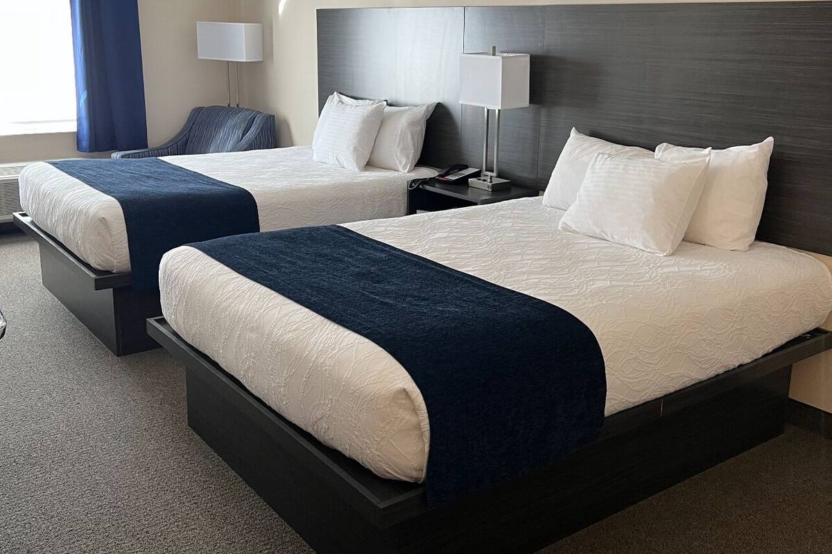 deluxe room, 2 queen beds | individually decorated, individually furnished, desk, laptop workspace