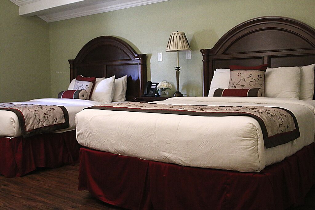 room 16 marcos coulon de villiers's (2 queen beds) | premium bedding, blackout curtains, iron/ironing board, free wifi