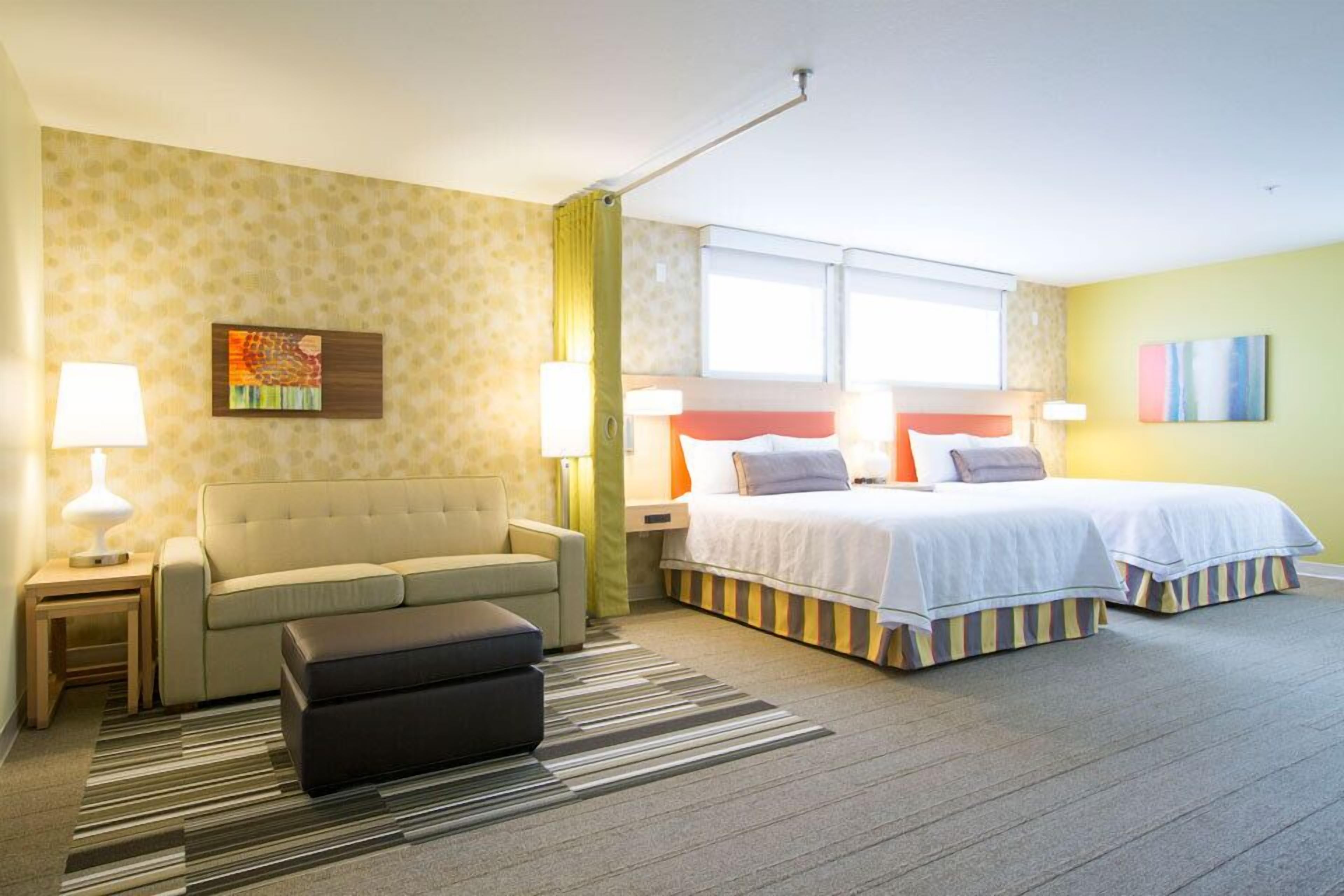 premium bedding, desk, laptop workspace, iron/ironing board