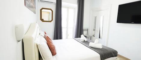 Draps en coton égyptien, minibar, coffres-forts dans les chambres