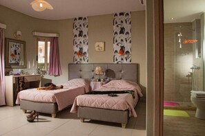 A bedroom with two beds, a vanity, and a shower area. - King's Village Apartments (Hersonissos)
