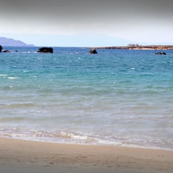 On the beach, sun loungers, beach umbrellas, beach towels