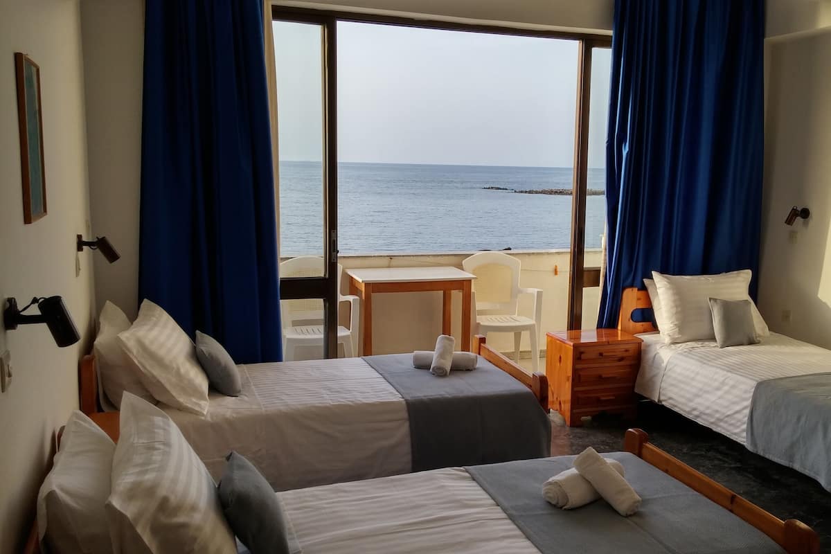 Chambre Triple, vue mer