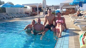 Seasonal outdoor pool, pool umbrellas, sun loungers