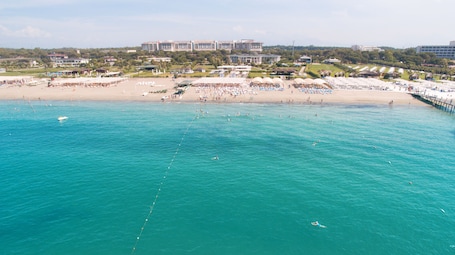 Private beach nearby, free beach shuttle, beach towels, beach bar