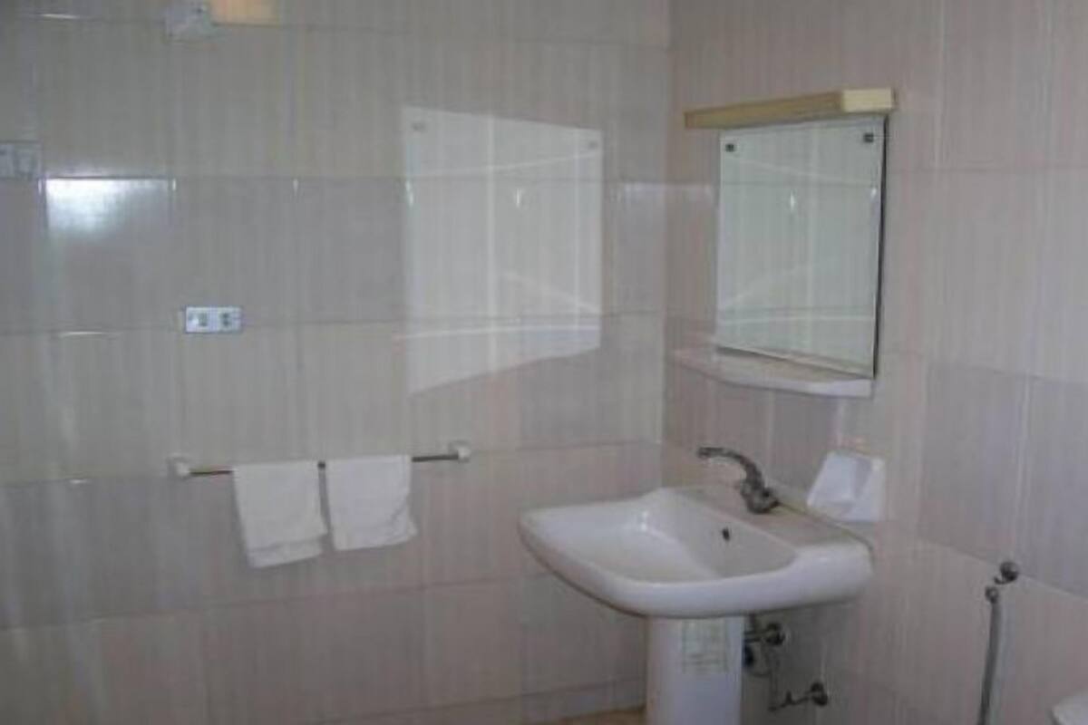 Standaard kamer | Badkamer | Een bad, gratis toiletartikelen, een haardroger, handdoeken