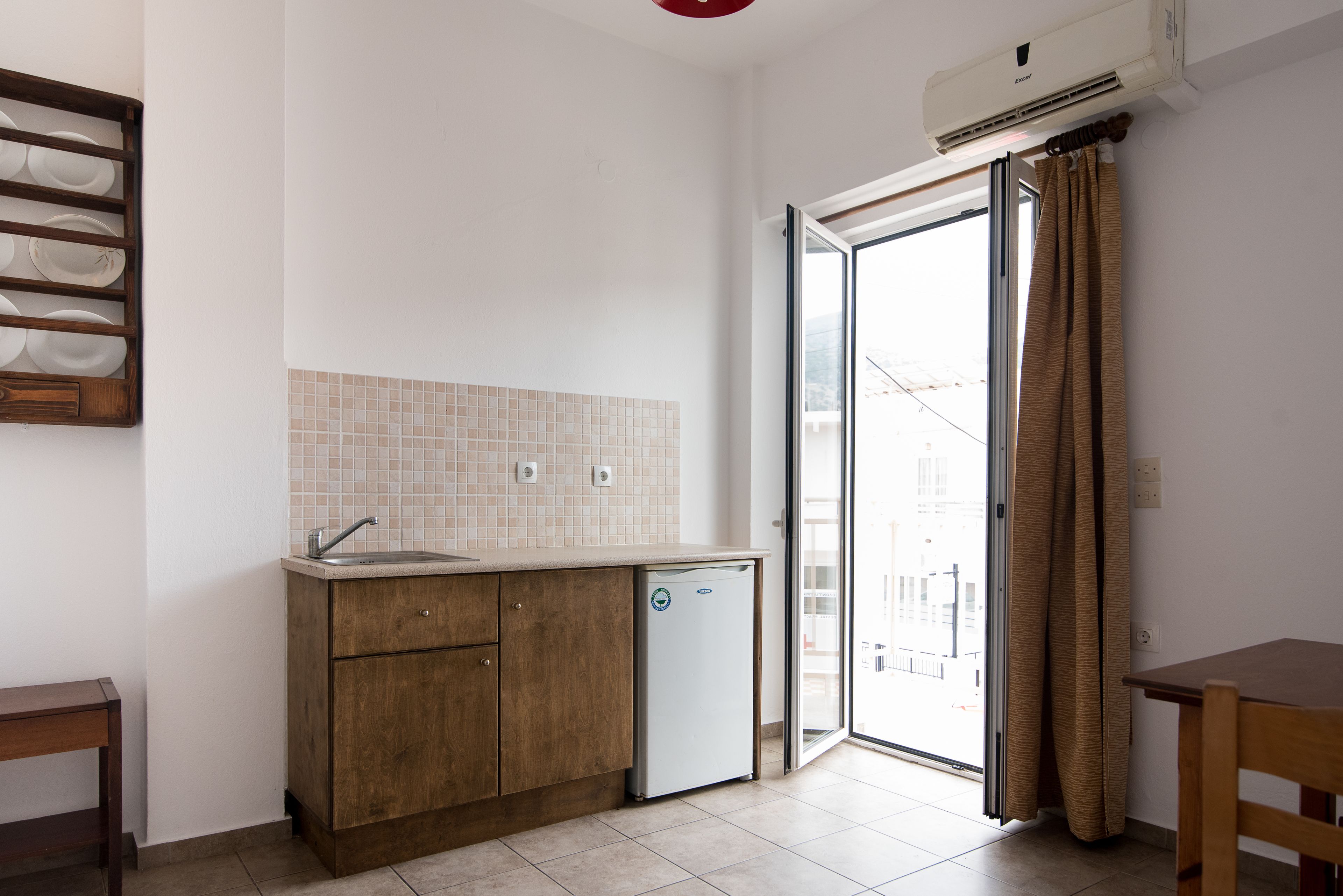 apartment, 1 bedroom | private kitchenette | fridge, stovetop, electric kettle, cookware/dishes/utensils