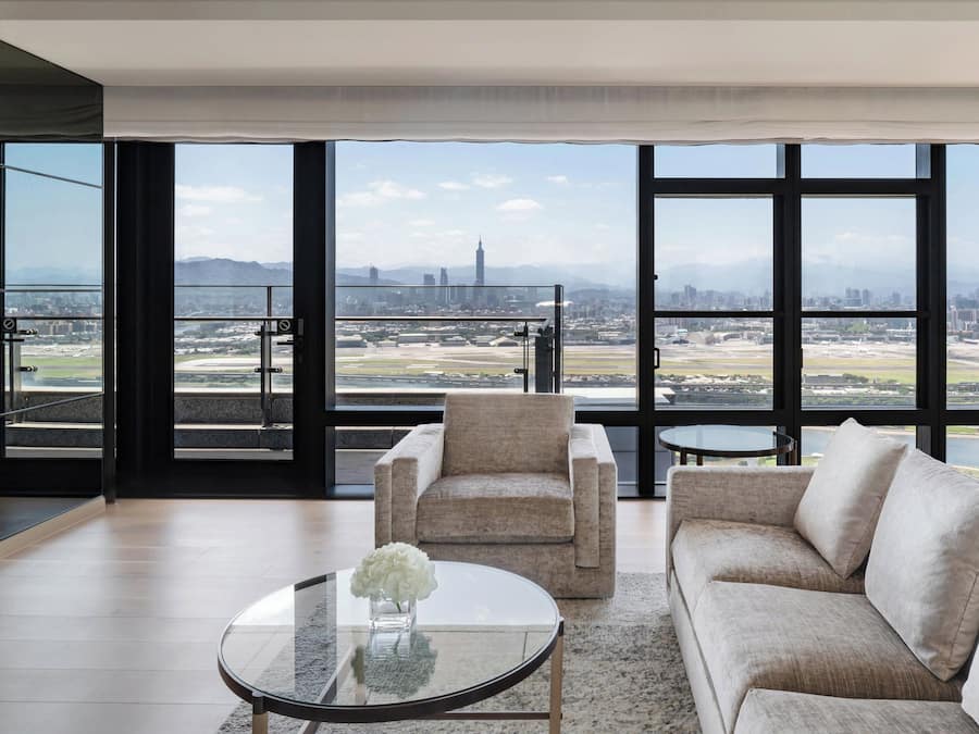 Executive Suite, 1 King Bed | Living area | 50-inch LCD TV with cable channels, TV, pay movies