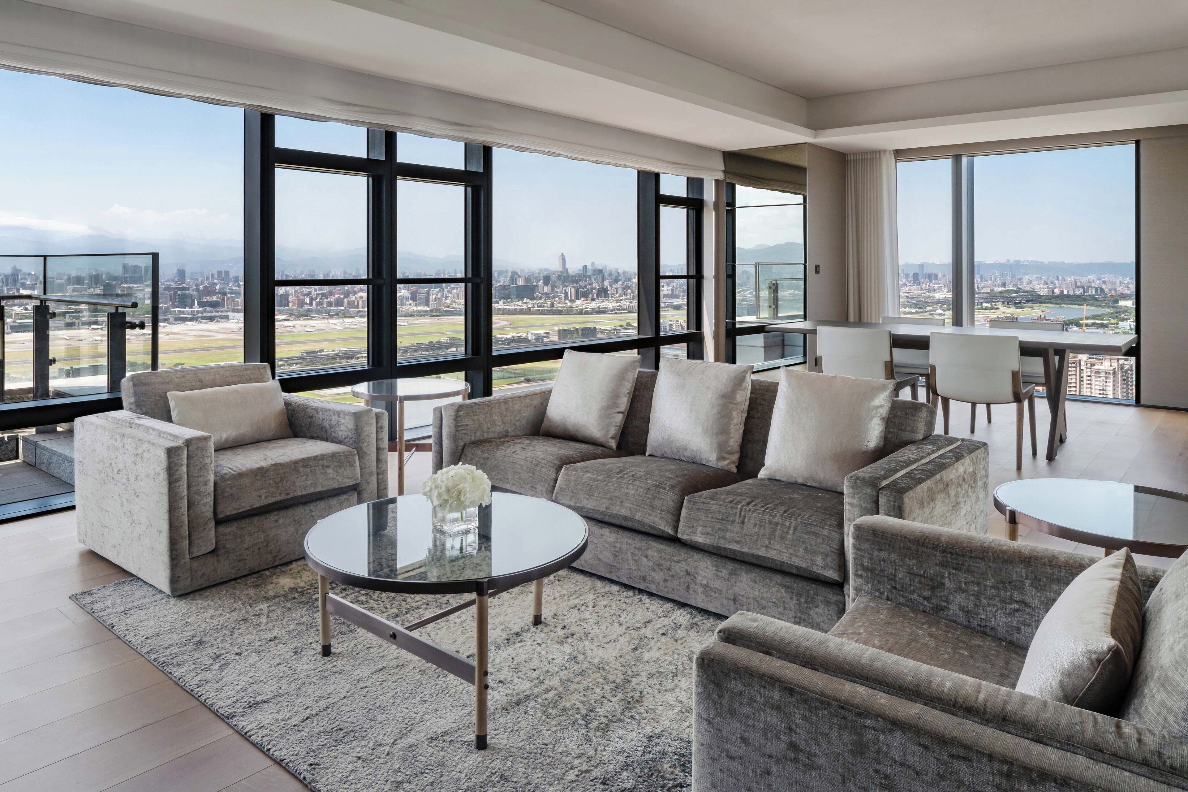 executive suite, 1 bedroom, executive level | living area | 50-inch lcd tv with cable channels, tv, pay films