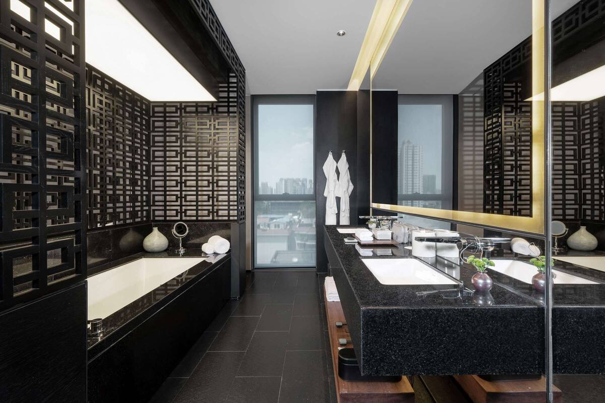 deluxe temple suite | bathroom | separate bathtub and shower, free toiletries, hair dryer, bathrobes