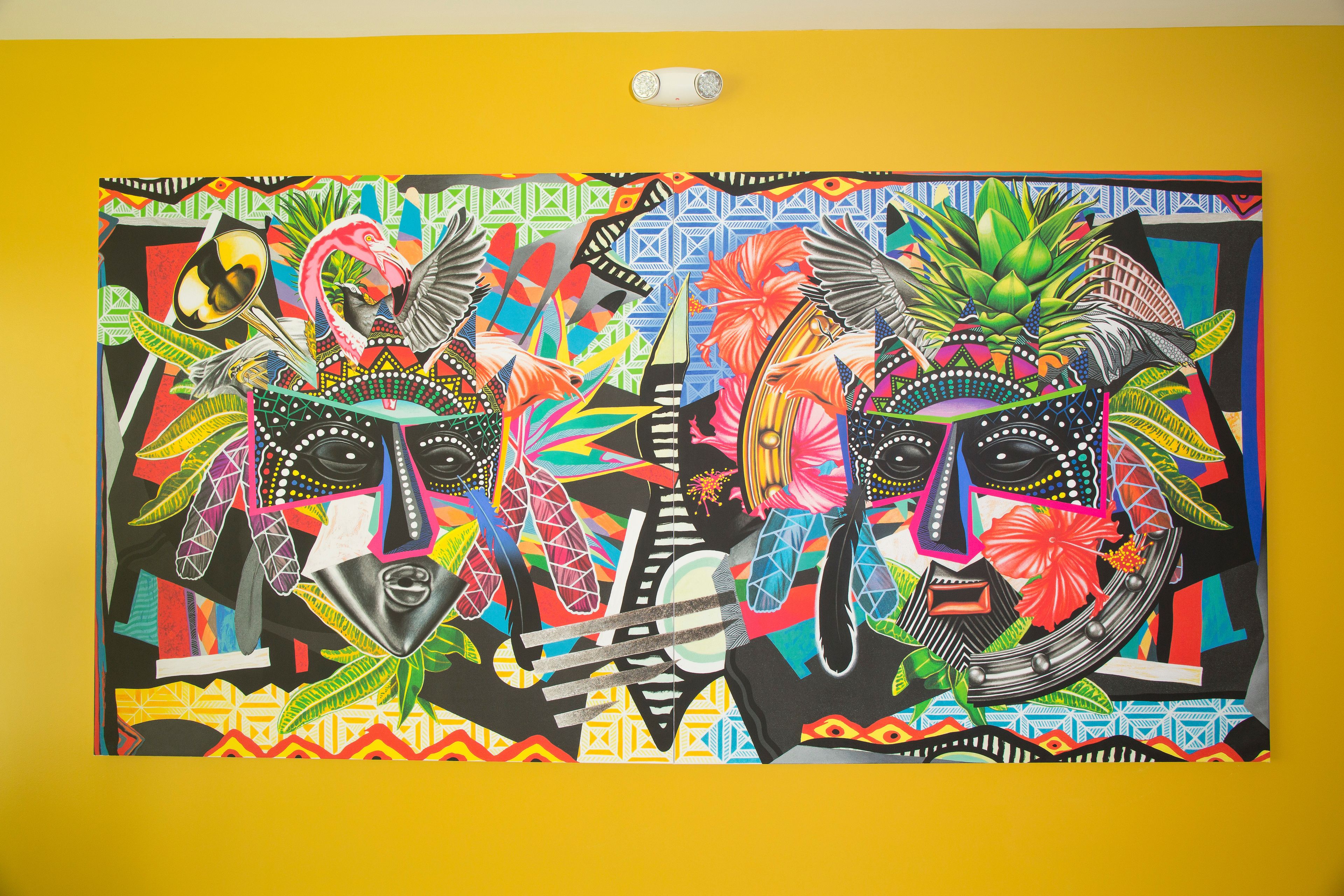 A vibrant mural with abstract patterns and figures.