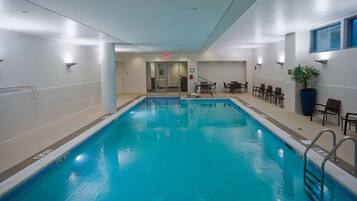 Indoor pool, open 6:00 AM to 10:00 PM, pool loungers