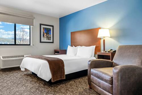 Premium bedding, pillowtop beds, desk, laptop workspace
