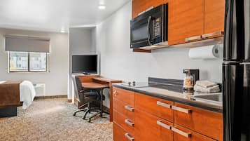 Premium bedding, pillow-top beds, desk, laptop workspace