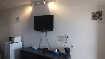 Double Room | Living area | 32-inch Smart TV with cable channels, streaming services