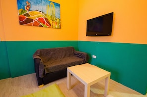 Comfort Quadruple Room, 2 Double Beds | Living area