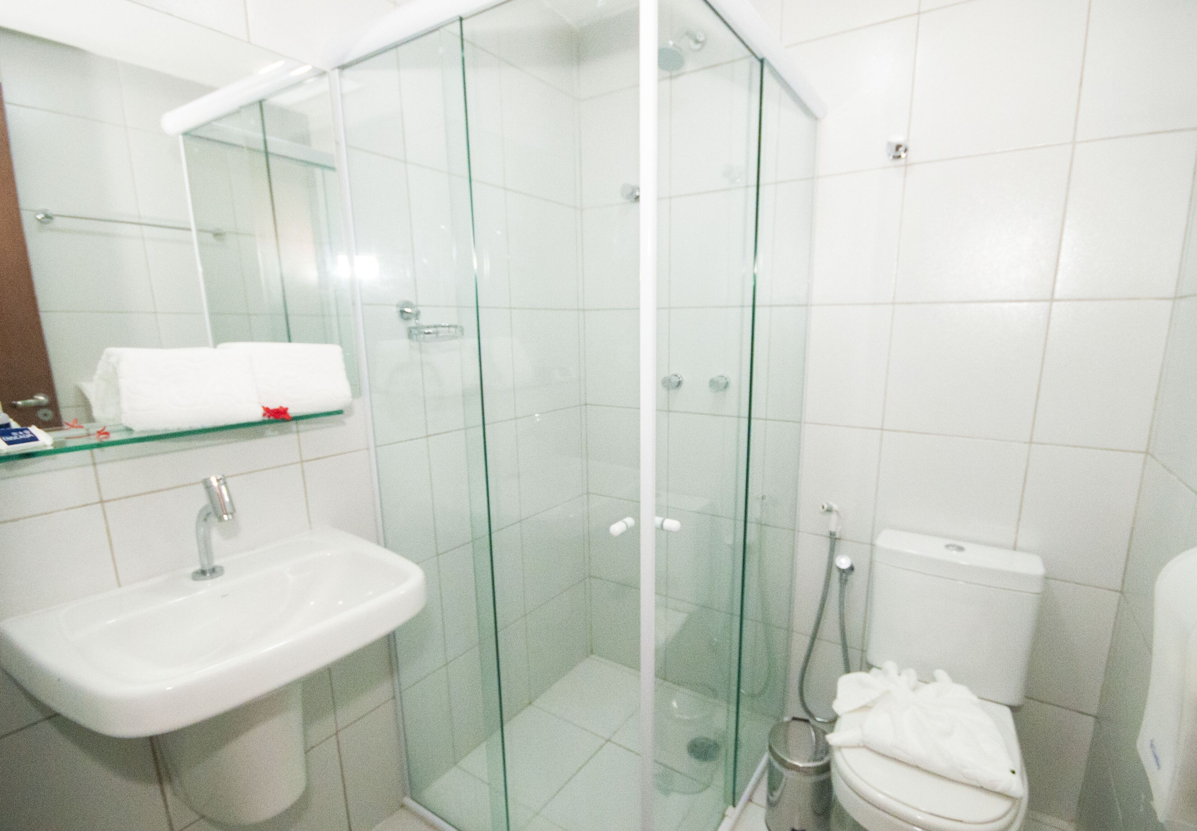 room 1 queen bed ou 2 single beds | bathroom | shower, hair dryer, towels, soap