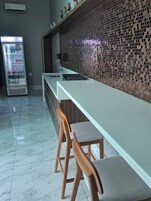 32-inch flat-screen TV with cable channels, TV