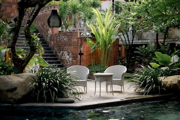2 outdoor pools, open 7:30 AM to 9:30 AM, pool umbrellas, sun loungers - Fourteen Roses Boutique Hotel Legian (Kuta)