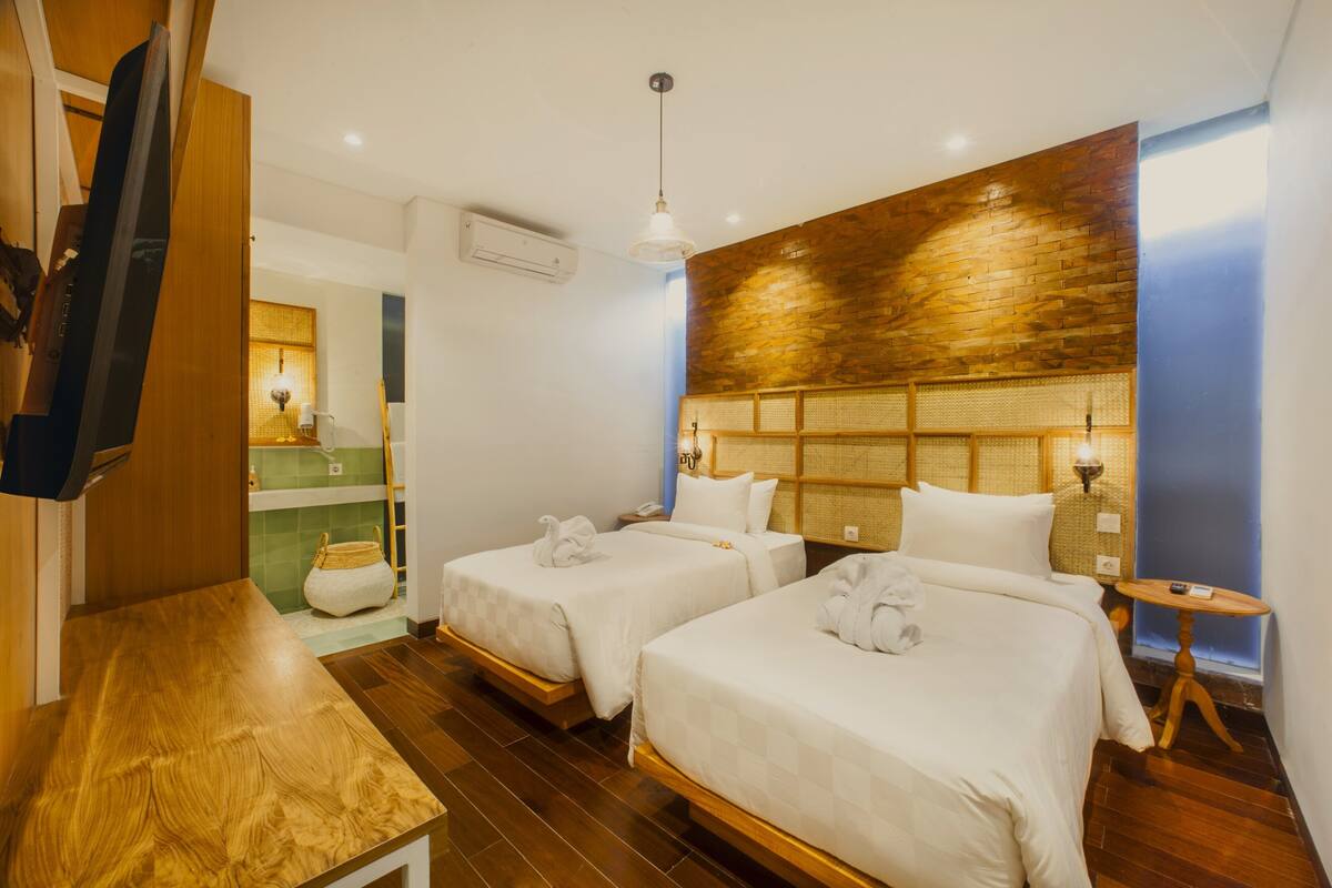 家庭套房, 2 间卧室 (Signature Mandala 2 Bedroom Suite) | 1 多间卧室、迷你吧、客房内保险箱、办公桌