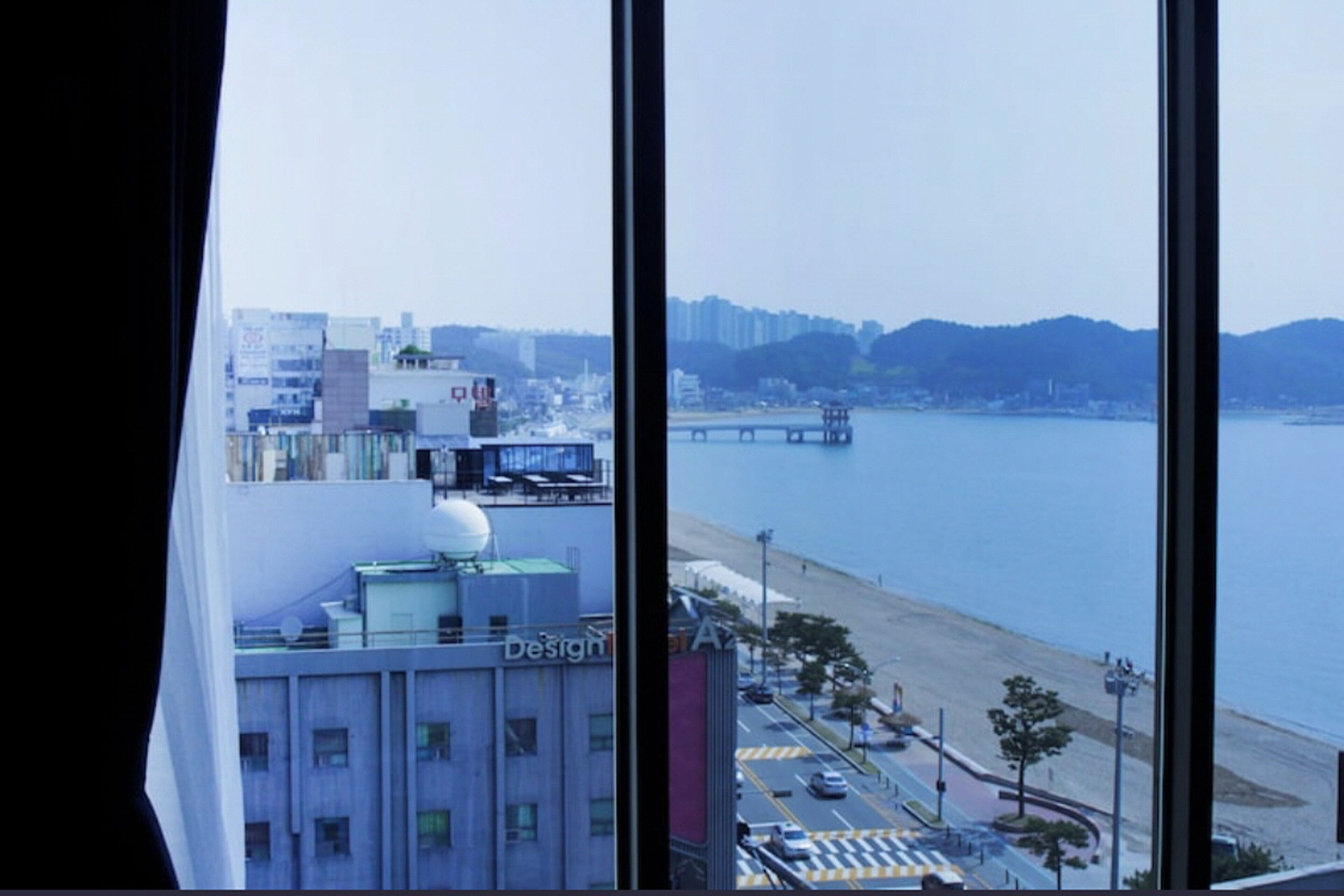 premium traditional room, partial ocean view | 1 bedroom, blackout curtains, free wifi, bed sheets