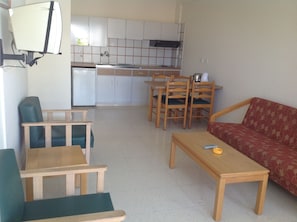 Departamento, 1 habitación | Área de sala de estar