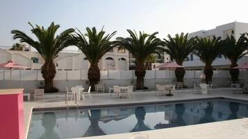 Outdoor pool, pool umbrellas, pool loungers