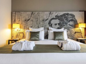 Premium bedding, in-room safe, individually decorated