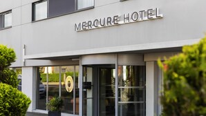 A hotel entrance with a sign reading 'Mercure Hotel.' - Mercure Belfort Centre (Belfort)
