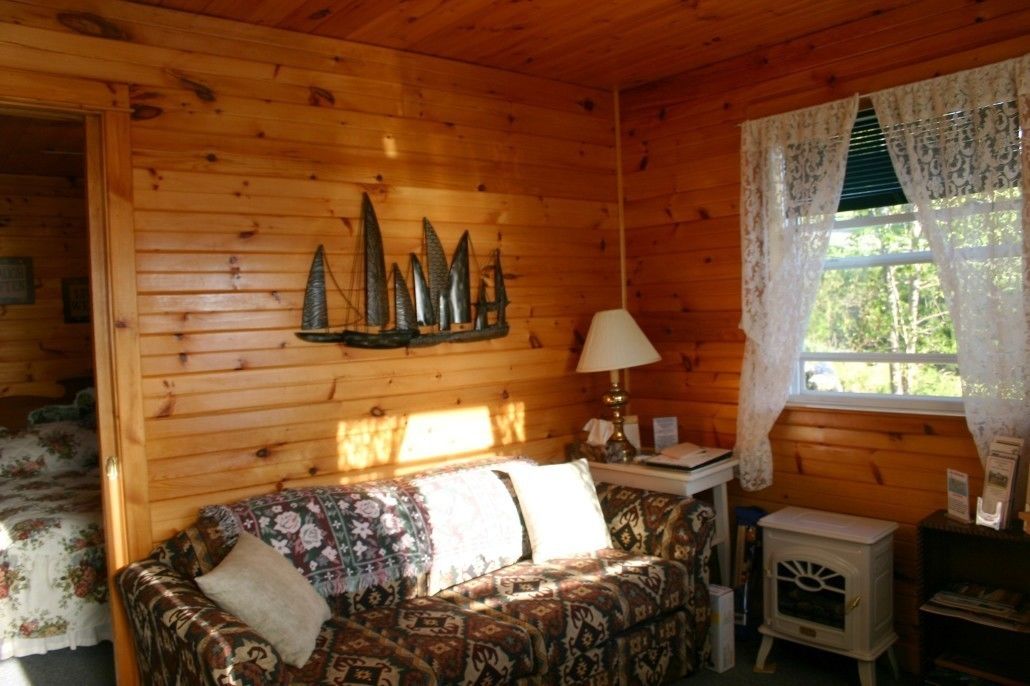 Standard-Ferienhaus, 2 Schlafzimmer, Gartenblick | Wohnbereich | Flachbildfernseher, Kamin, DVD-Player