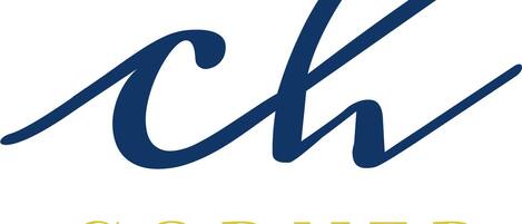 A logo with the text "ch CORNER HOUSE".