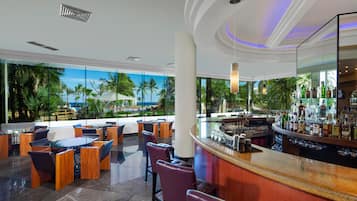 15 bars/lounges, 2 beach bars, poolside bar