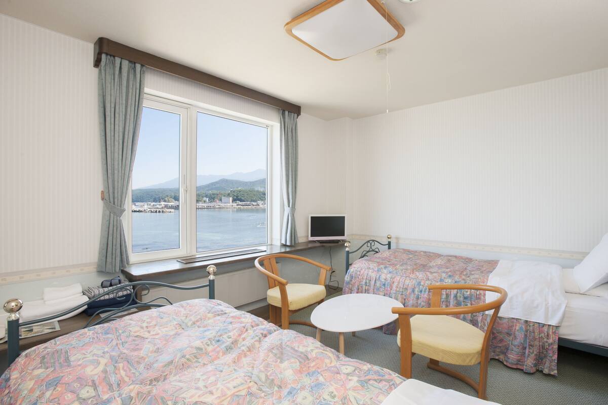 down duvets, desk, blackout curtains, iron/ironing board