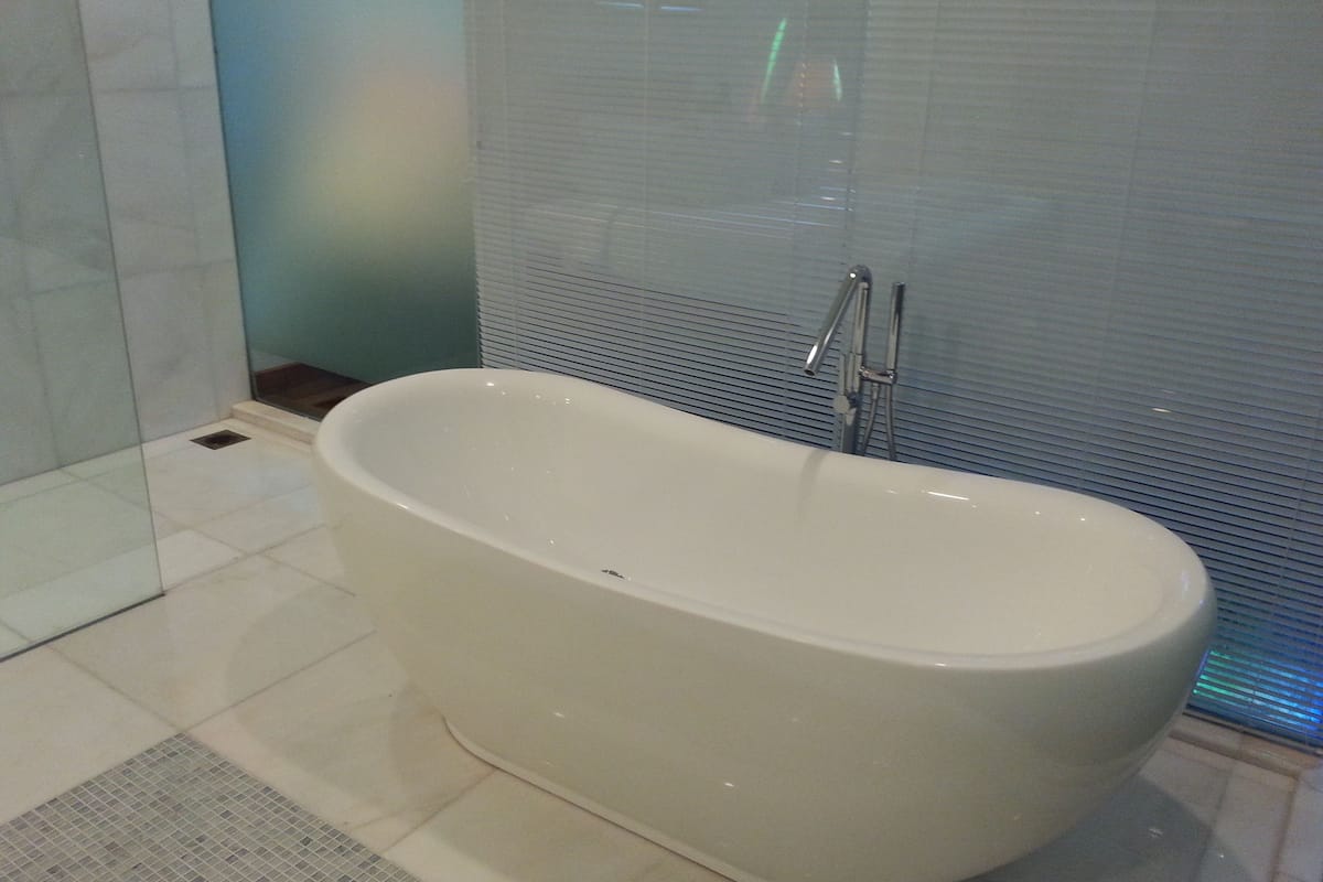 signature suite, 1 king bed | deep-soaking bathtub