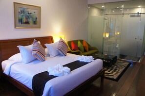 Suite Deluxe | Literie de qualité, minibar, coffre-fort, décor unique