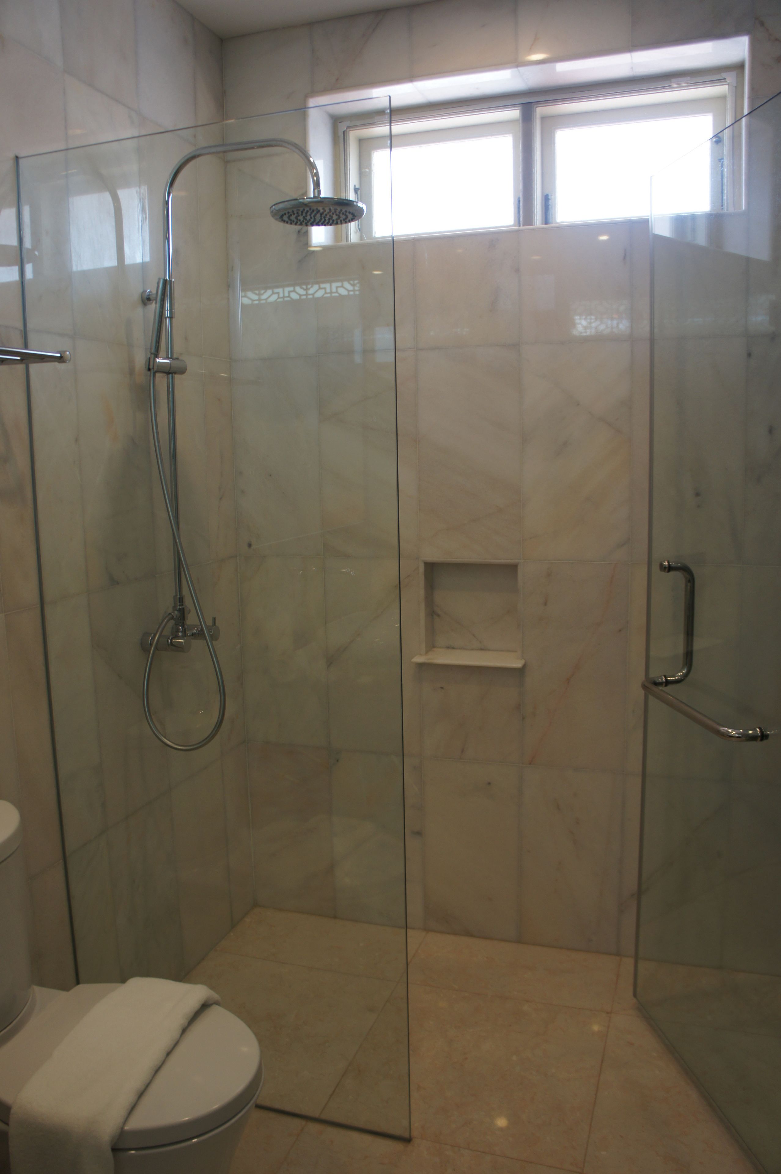 grand suite, 1 king bed | bathroom | shower, rainfall showerhead, free toiletries, hair dryer