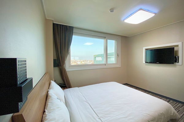 Desk, blackout drapes, soundproofing, free WiFi