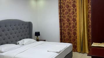 Departamento Deluxe, vista a la ciudad | 1 habitación y ropa de cama de alta calidad