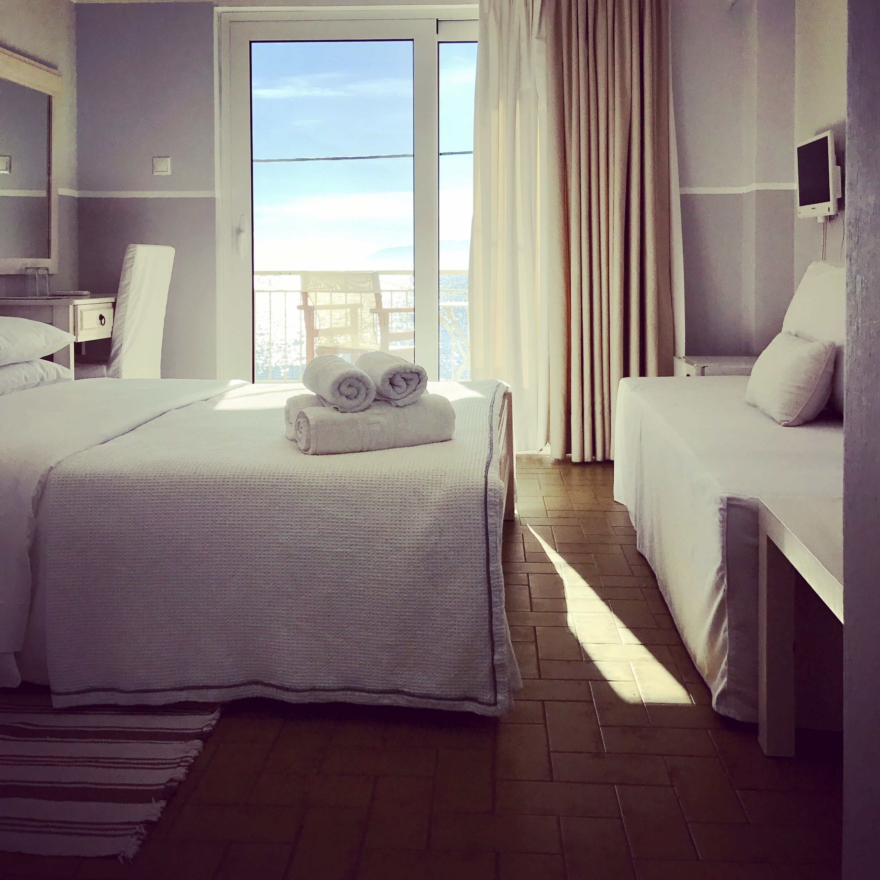 pillow-top beds, desk, blackout curtains, soundproofing