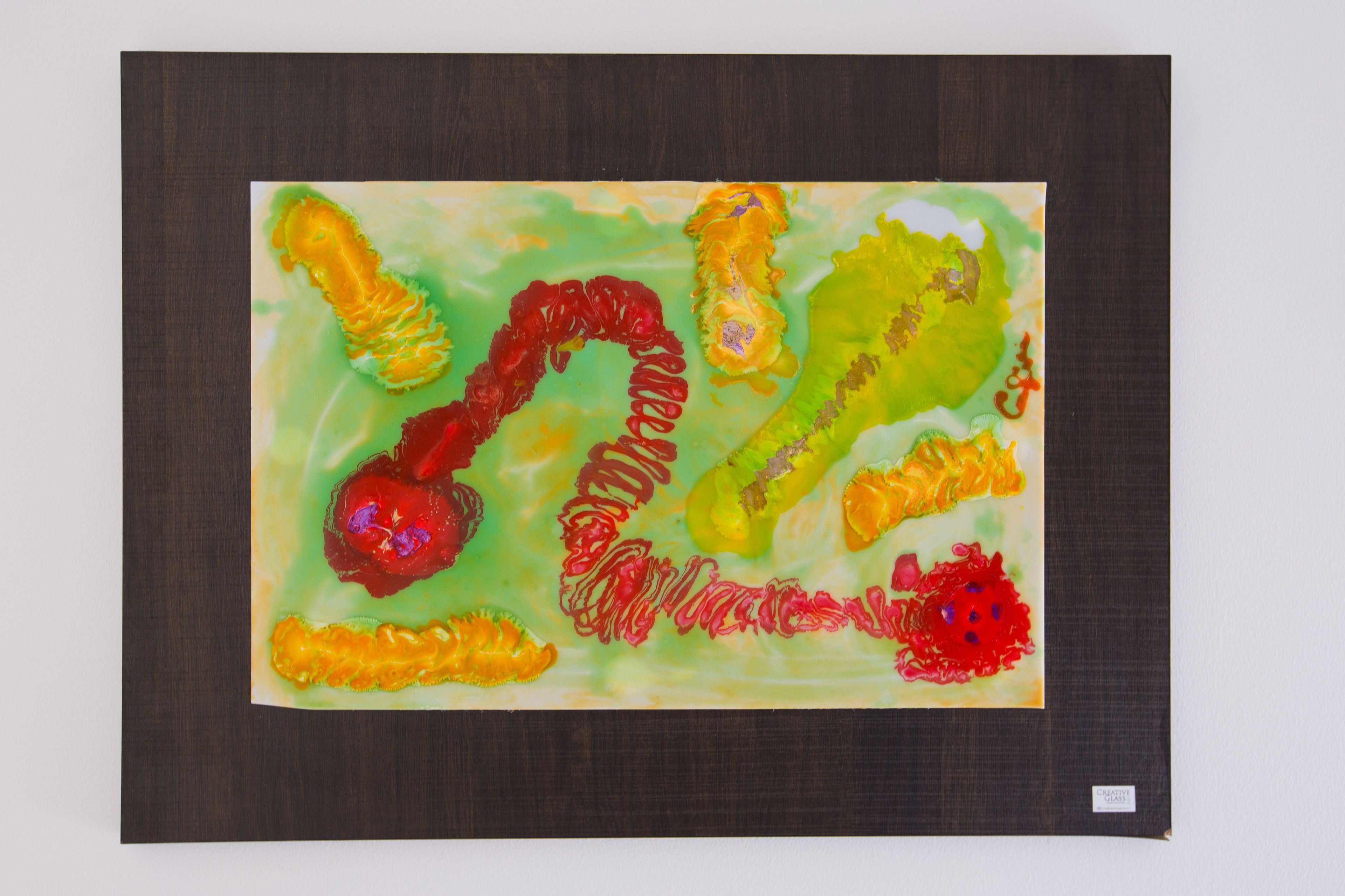 A colorful abstract painting on a canvas.