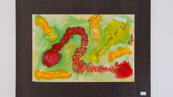 A colorful abstract painting on a canvas.