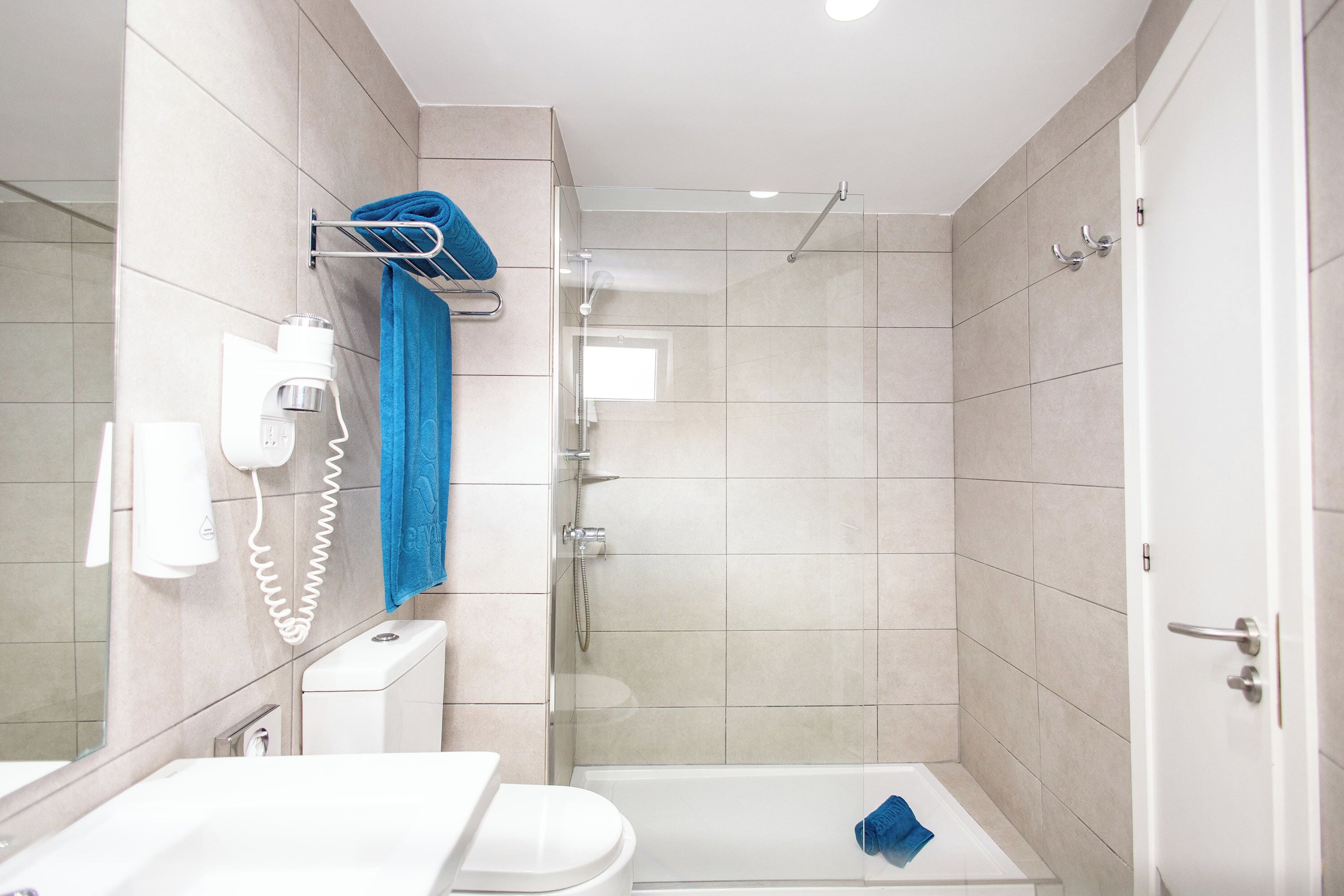 shower, free toiletries, hair dryer, dressing gowns