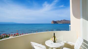 Sea-view apartment: Beach-Front | Memory-foam beds, in-room safe, soundproofing, iron/ironing board