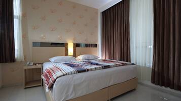 Deluxe tweepersoonskamer, 1 slaapkamer | 1 slaapkamer, een bureau, gratis wifi, beddengoed